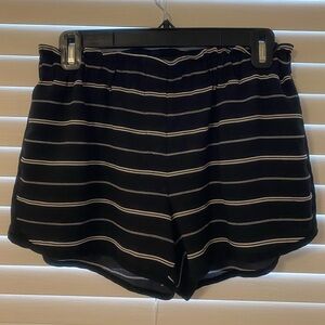 Lumiere size L black and white striped shorts
